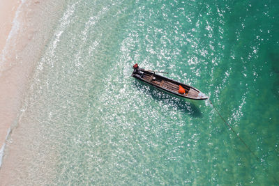 High angle view of boat sailing on sea