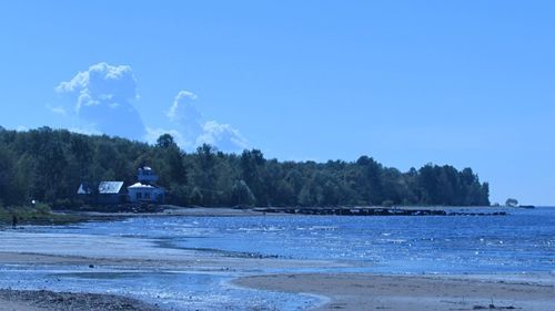 Scenic view of landscape against clear blue sky