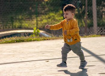 Full length of boy playing