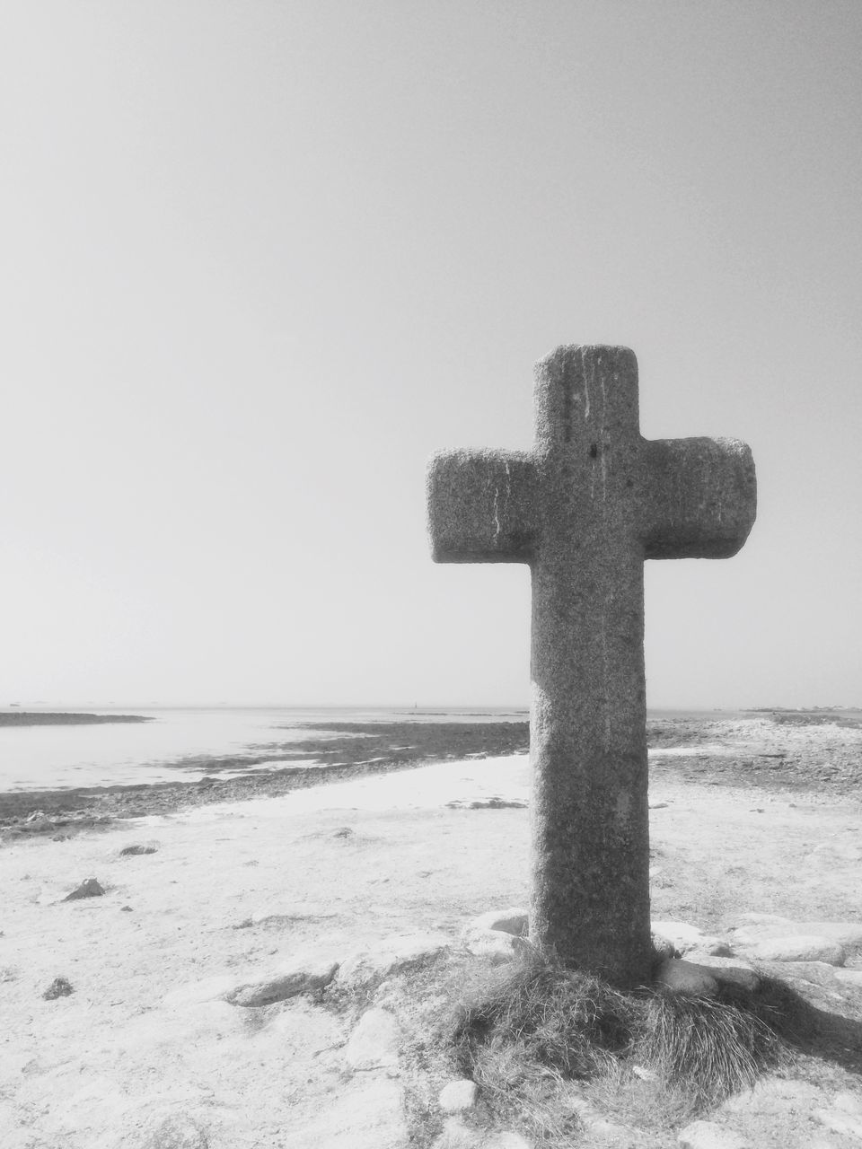 sea, horizon over water, spirituality, cross, clear sky, religion, day, no people, sky, outdoors, tranquility, beach, nature, water, beauty in nature, close-up