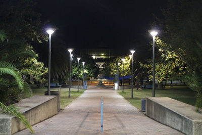 Empty walkway at night