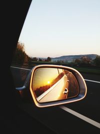 Sunset seen through car windshield