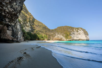 Scenic view of sea against clear blue sky