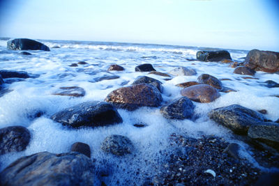 Scenic view of beach against sky