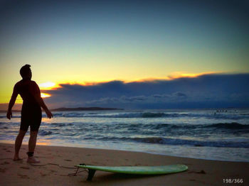 Scenic view of sea at sunset