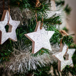 Close-up of christmas decoration hanging on tree