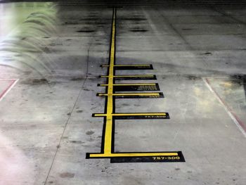 High angle view of information sign on road