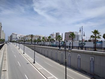 View of bridge in city against sky