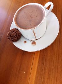 High angle view of coffee cup on table