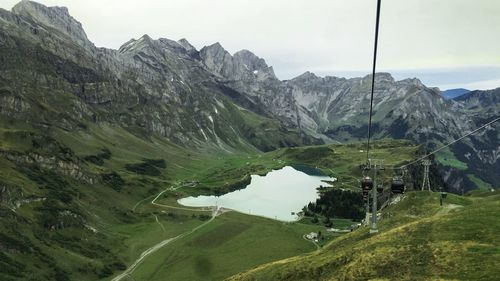 Scenic view of landscape and mountains against sky