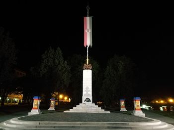 Low angle view of illuminated street light at night