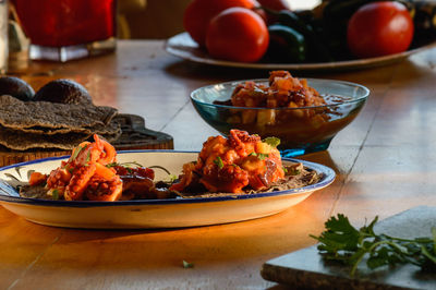 Close-up of fruits in plate on table