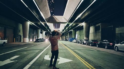 Woman walking on road