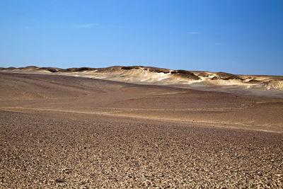 Scenic view of desert against sky