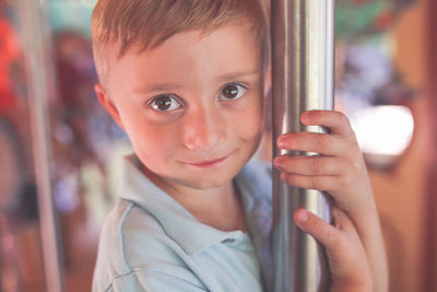 Close-up portrait of boy looking at camera