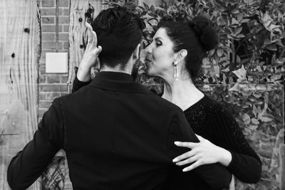 Young couple standing outdoors