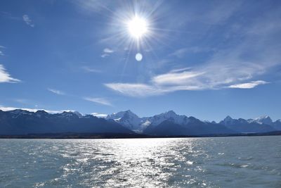 Scenic view of sea against sky on sunny day