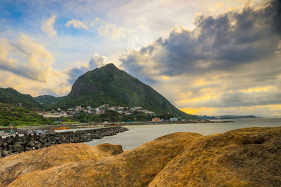 Scenic view of sea against sky at sunset