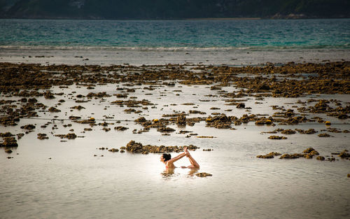 People enjoying on beach