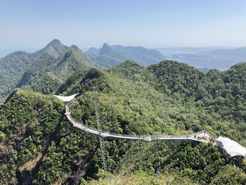 High angle view of road amidst mountains against sky