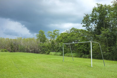 Scenic view of soccer field against sky