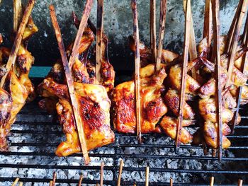 Close-up of meat on barbecue grill