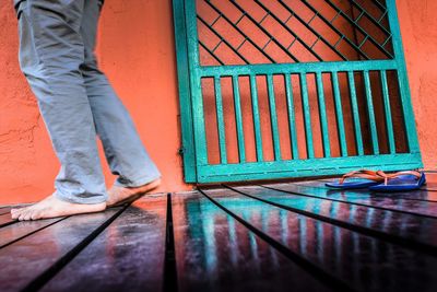 A person walking on a wood flooring