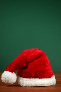 Close-up of hat on table against gray background