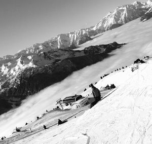 Scenic view of snow covered mountains