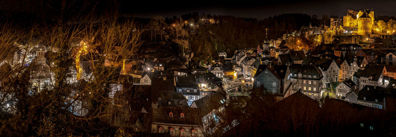 High angle view of illuminated buildings at night