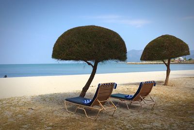 Scenic view of beach against clear sky