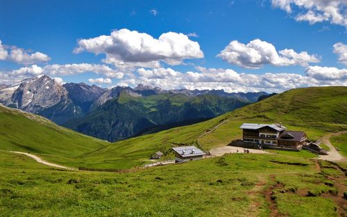 Scenic view of landscape and mountains against sky