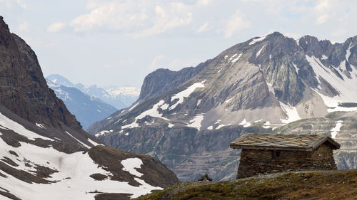 Scenic view of mountains against sky during winter