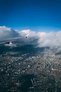 Aerial view of cityscape against sky