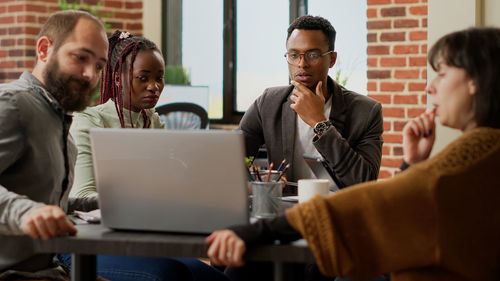 Business colleagues working at office