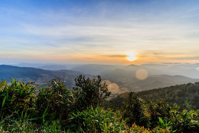 Scenic view of mountains against sky during sunset