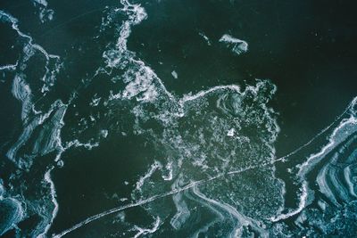 Close-up of sea against blurred background