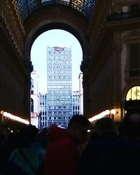 Crowd in illuminated city