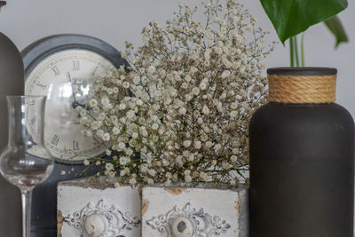 Close-up of white flowers on table