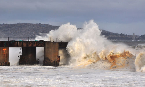 Built structure against cloudy sky