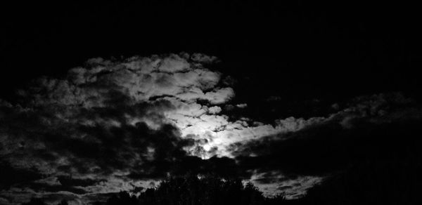 Low angle view of clouds in sky at night