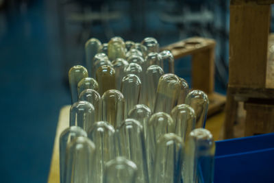 Close-up of bottles in row