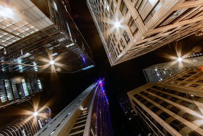 Light trails in illuminated city at night