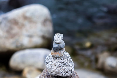 Close-up of stone stack on rock