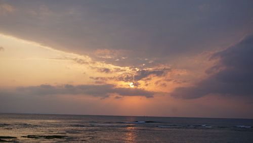 Scenic view of sea at sunset