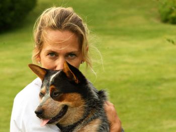 Portrait of woman with dog