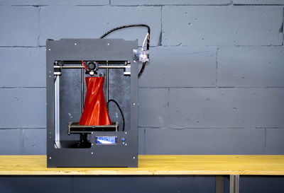 3d printer working close up. automatic three dimensional 3d printer performs plastic. 