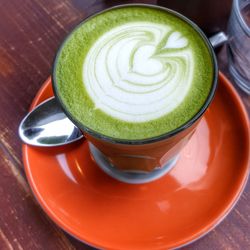 High angle view of matcha latte on table