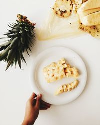 High angle view of person holding food