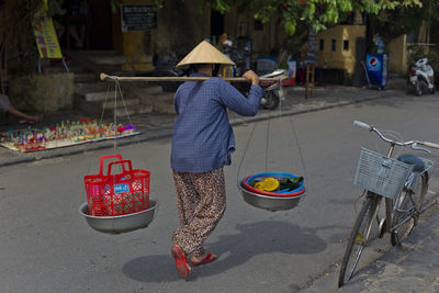 Street seller in hoi an vietnam